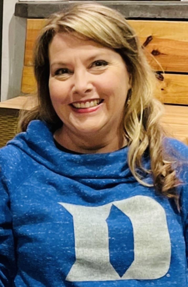 headshot of Kathy McCurdy in a blue Duke sweatshirt