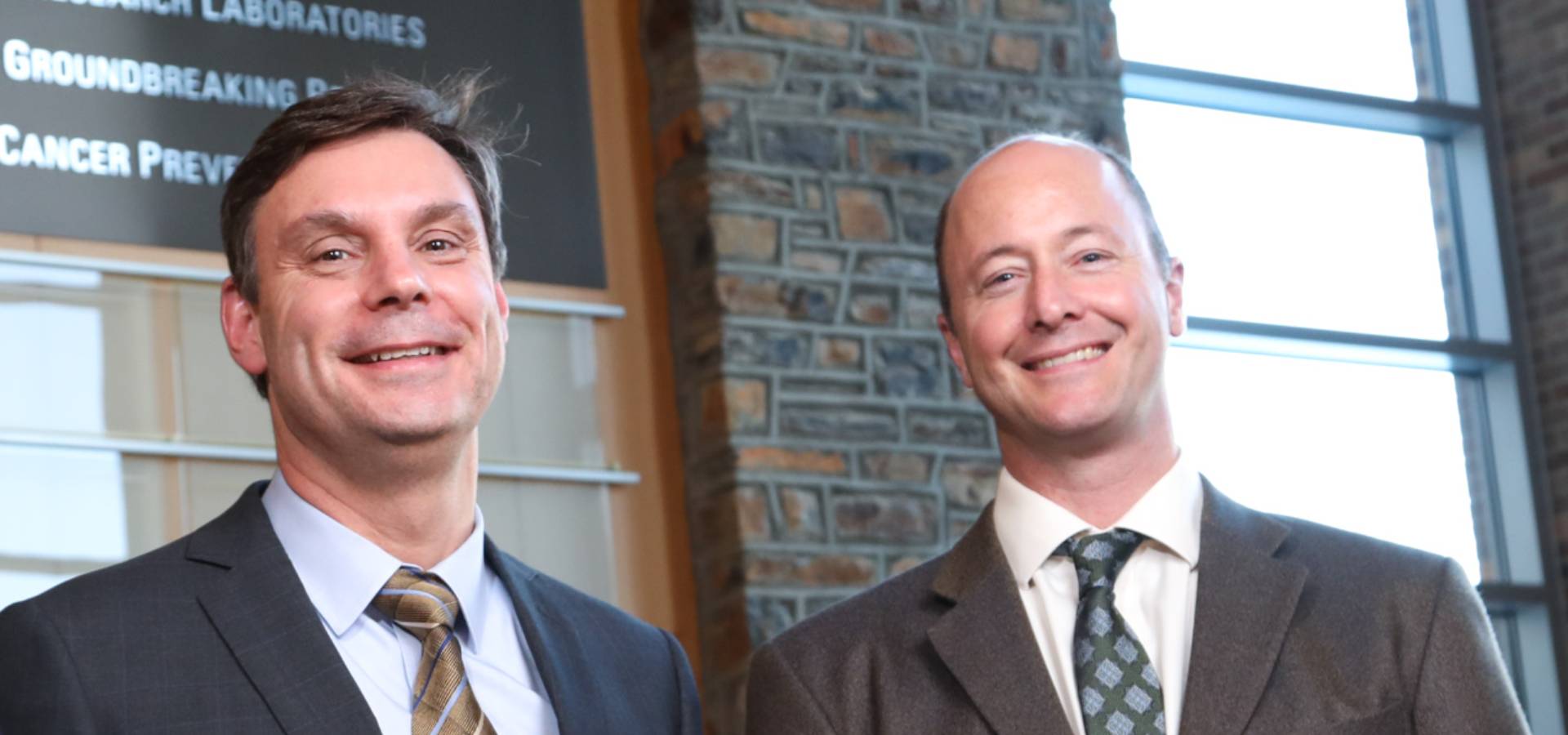 Two prostate and urologic center members pose together