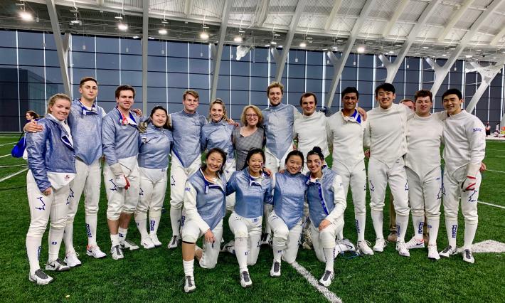 The Duke Fencing men's and women's teams in their fencing whites at Northwestern University