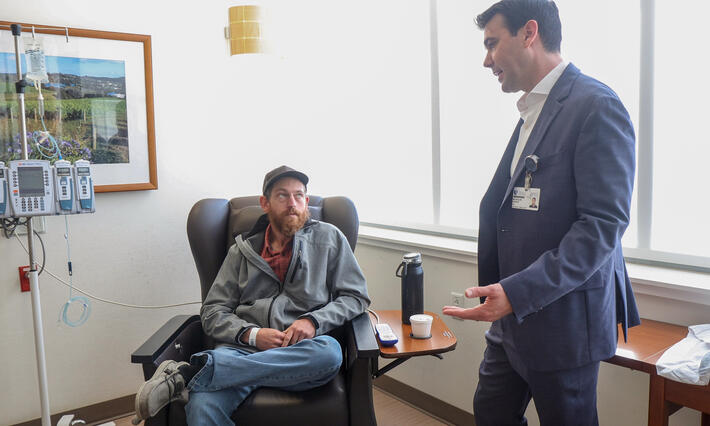 Dr. DeVito checks in when Spencer is receiving treatment