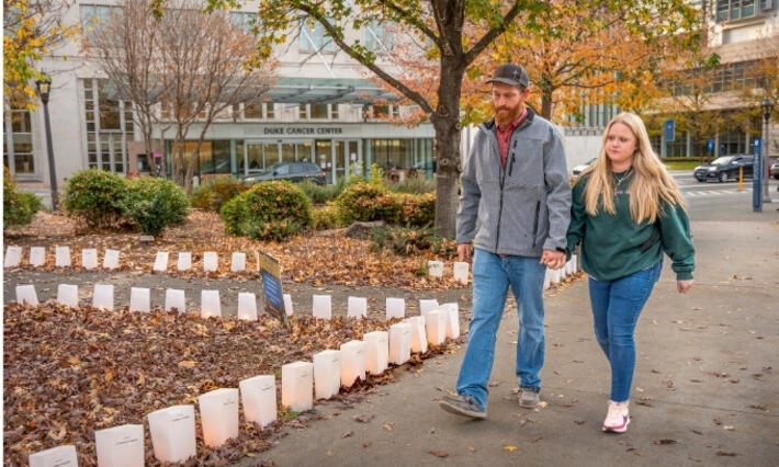 The Lairds outside the Cancer Center.