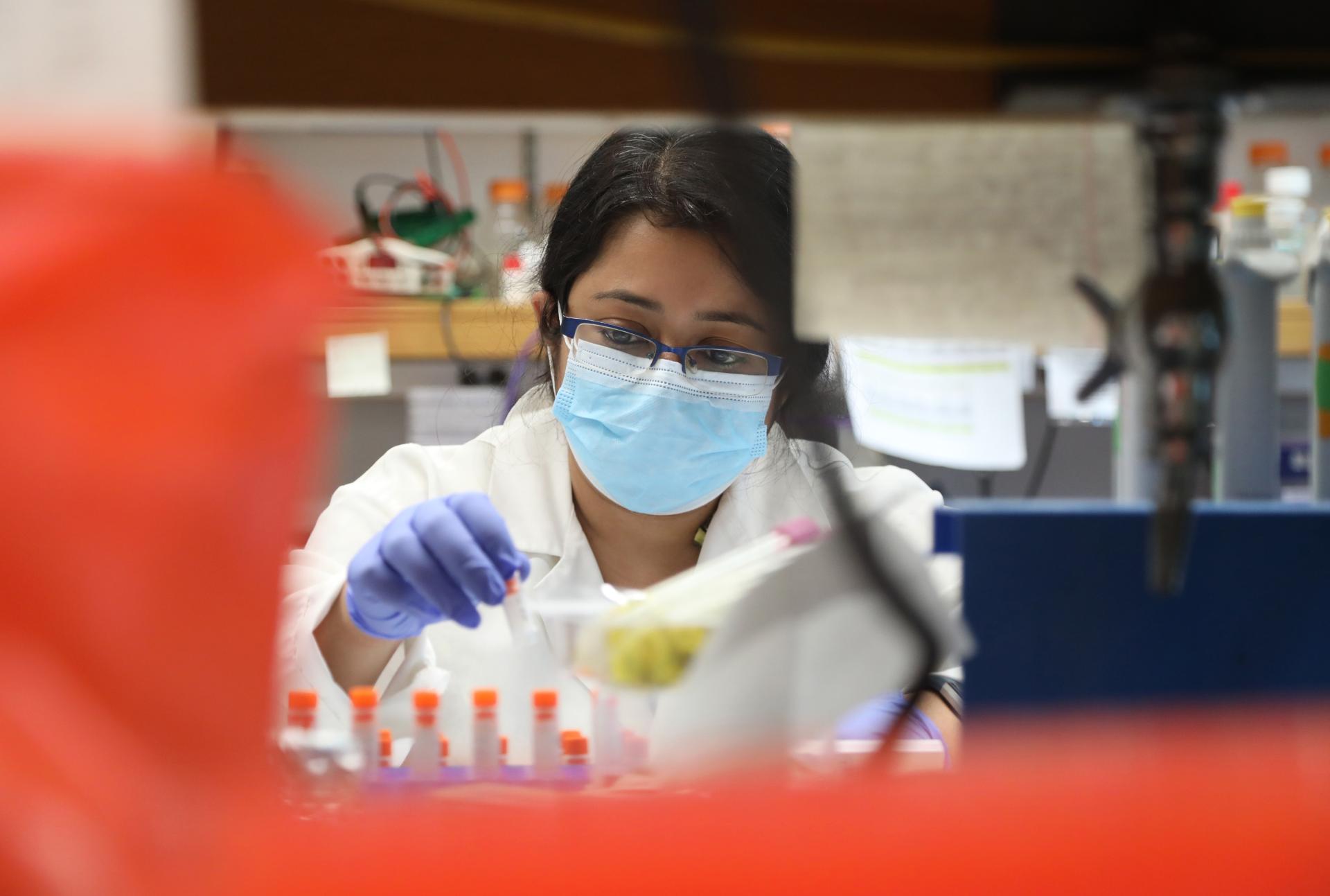 Binita Chakraborty working in a lab