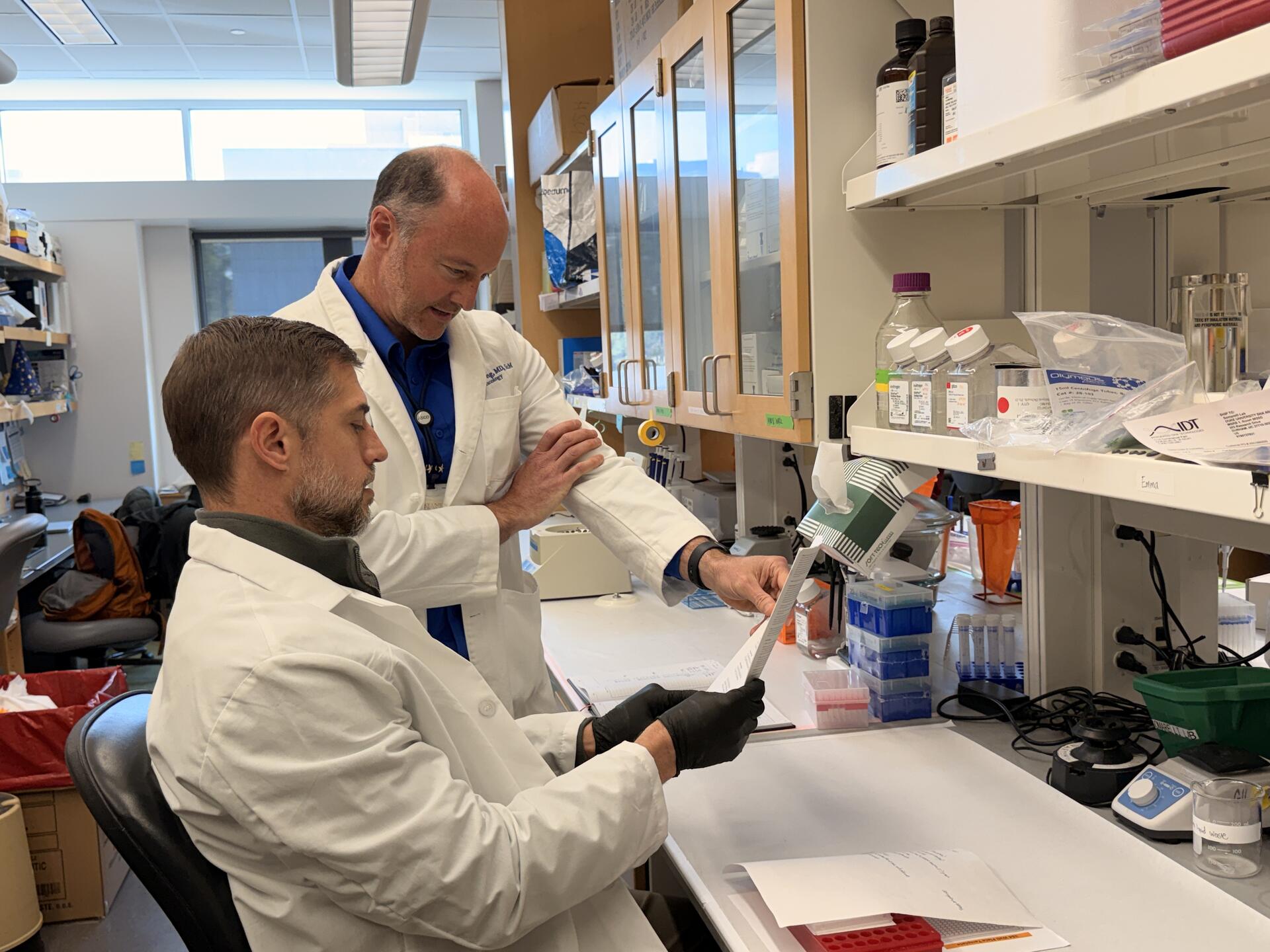 Andrew Armstrong and Jason Somarelli in the lab
