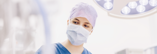 Female surgeon during surgery in operating room