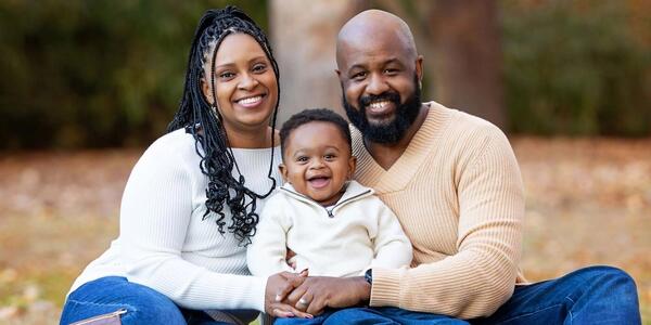 Arlene Brown smiles for a family photo with her husband, Richard, and their son Andrew. Photo courtesy of Faith V Photography