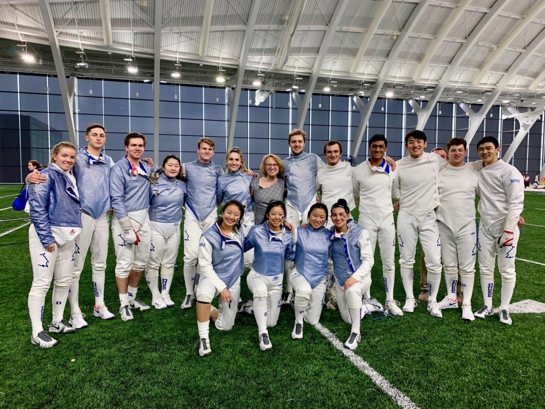 The Duke Fencing men's and women's teams in their fencing whites at Northwestern University