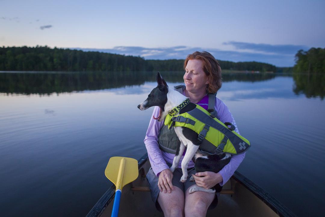 Photo of Melissa Culbreth kayaking wtih dog