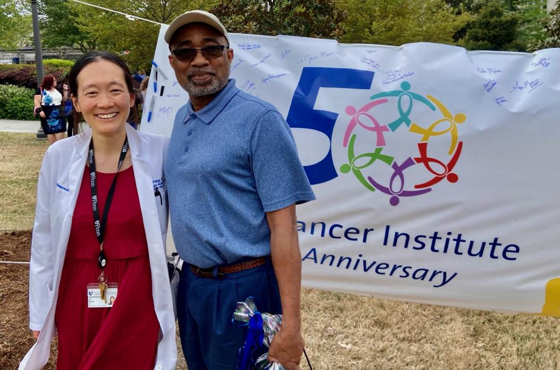  Jie Wang, MD, and her patient Ovester Grays catch up at the DCI 50th Anniversary kickoff