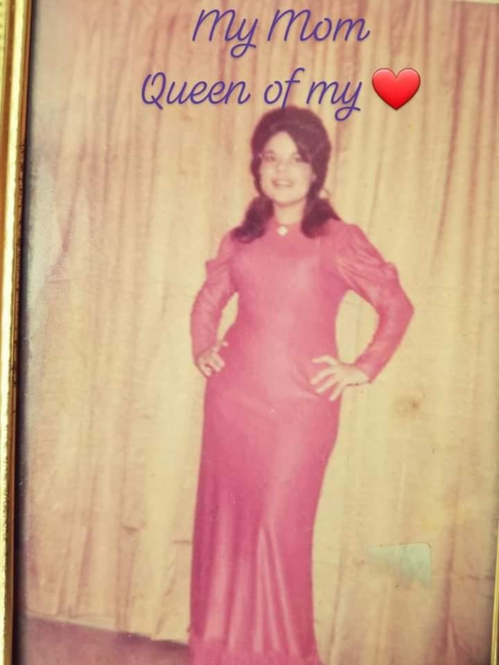 framed photo of a young woman in a long pink dress with "My mom, queen of my heart" written across the top